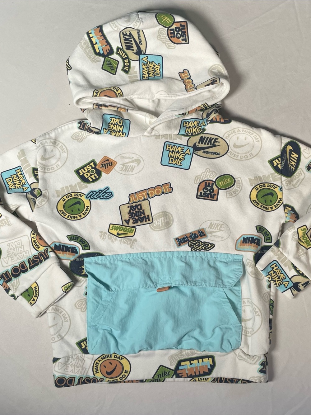 Nike AOP Boys Hoodie with Multicolor Badge Prints & Light Blue Pouch Aprox 2T